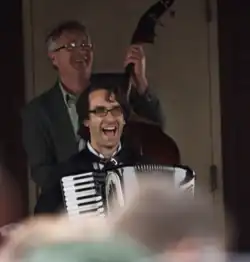 Reich playing the accordion in 2011