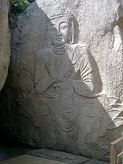 Yeorae Image Seated on Stool and Carved on Rock Surface At Beopjusa, Treasure No. 216, Sanae-ri. Naesongni-myeon, Boeun-gun Chungcheongtuk-do