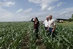 Brooke Rollins and RFK Jr. in a field