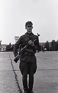 Albanian People's Army soldier holding ASH-78.