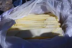 Thin, folded pieces of rushan in a wrapper