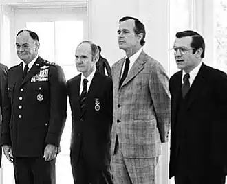 Secretary of Defense Donald Rumsfeld with Chairman of The Joint Chiefs of Staff General George S. Brown, National Security Advisor Lieutenant General Brent Scowcroft, and C.I.A. Director George H. W. Bush at The Oval Office, White House, March 11, 1976