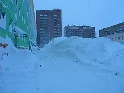 Snow piles on Shakhtyorskaya street