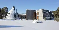 The Sámediggi, the Sámi Parliament of Norway, in Kárášjohka, showing modern buildings in a snowy landscape.