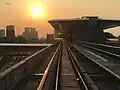 Sungai Buloh train approaching the station in the evening