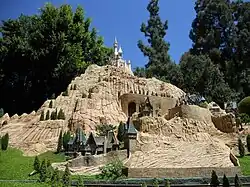 French village featuring a castle from Cinderella