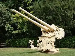 A twin mounting without its protective shield, exposing the positions of the three aimers for the rotation, elevation and canting axis.