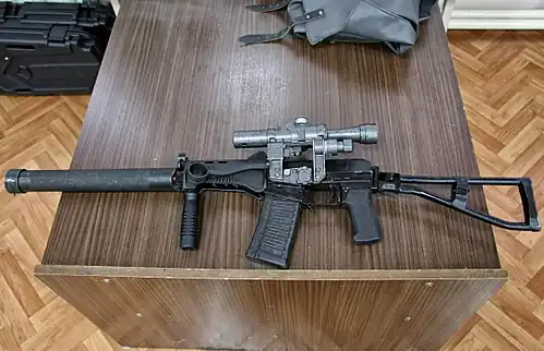 A left-side view of the SR-3M equipped with a suppressor and PSO-1 scope