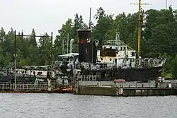 Former Finnish Ladoga Navy ship, the scavenger Kiviniemi, among other ships awaiting scrapping in Sortanlahti Bay, Ladoga, 2008.