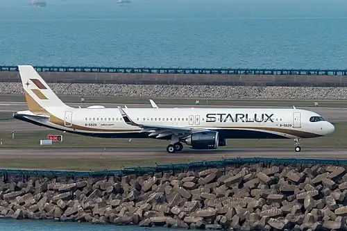 This Starlux Airlines A321neo has doors R3/L3 plugged and replaced with windows (seating: 188, maximum: 200).[16] (The interior panel is windowless.[22]) Delta and United also carry the same door-arrangement configuration for their A321neo fleets.