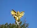 The statue of a bird immortal sacred to the Naxi people.