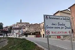 Welcome to Salcito sign with town in background
