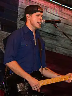 Riggs performing in 2014
