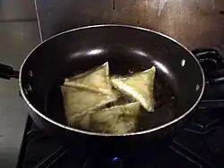 Somali sambuus being fried