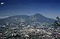 The massive compound San Salvador (volcano) dominates the landscape west of El Salvador's capital city of San Salvador.