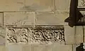 A spolia on the left of the main portal
