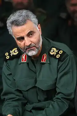 Man in military uniform with white beard facing forward
