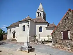 The church, cross and war memorial in Saules