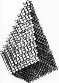 Drawing of a scalenohedron (saw-tooth crystal) constructed from spheres
