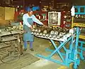 Use mobile scissors lifts.