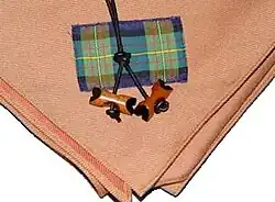 Image 27Wood Badge beads and neckerchief. Wood Badge is the premier Boy Scout adult leader training course. A holder of the Wood Badge is a leader highly trained and dedicated Scout leader.