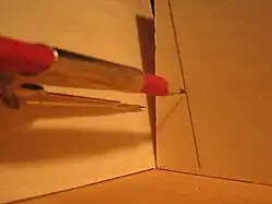 Compass for tracing a line.