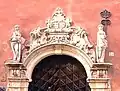 Portal at Number 2B, featuring the escutcheons of Erik and Elisabeth Ryning flanked by Hope and Faith.