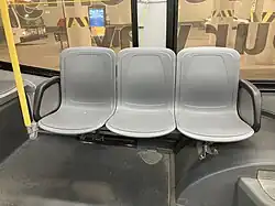 A photo of grey Niagara Transit seats on a bus.