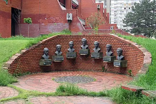 Seven busts on a wall