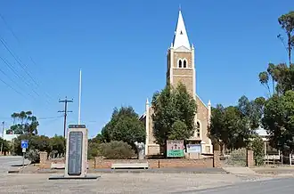 Pilgrim of Zion Lutheran church. A war memorial is in the foreground
