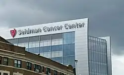 University Hospitals Cleveland Medical Center Seidman Cancer Center behind a mixed-use apartment building
