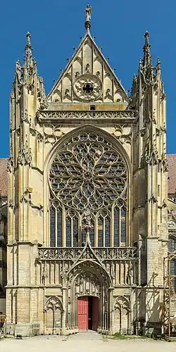 The South transept rose window and portal, in the Flamboyant Gothic style (15th c.)