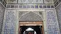 Calligraphy above a door