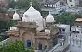 Aerial view of the mosque with one large and two small domes