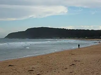 Shelly Beach on a windy day in 2010, taken from the sand dunes. Crackneck Lookout in the background.