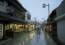 A street view of Shibamata showing traditional storefronts