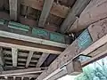 The underside of the bridge showing biblical passages