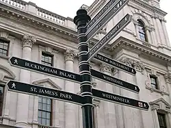 Image 5A signpost on Parliament Square with directions for nearby attractions (from Tourism in London)