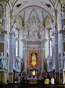 Interior of the Basilica of the Nativity of the Blessed Virgin Mary, Šiluva (built in 1760–1772) with the Our Lady of Šiluva in the main altar[39]