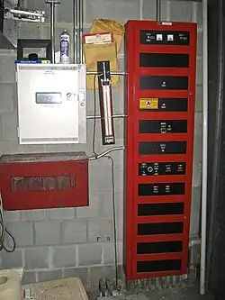 A Simplex 4010 addressable fire alarm panel tied into an older Simplex 4208 conventional fire alarm panel
