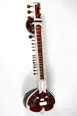 Sitar with resonator made from a bottle gourd.[46] Surbahar is similar but larger and with lower sounds (something like a bass sitar)[47]