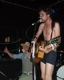 Sleeping in the Aviary performing live. Elliott Kozel is on the right.
