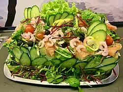 Heavily sallad garnished smörgåstårta