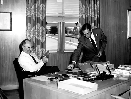 Examining NACA award for 35 years of service (1957)