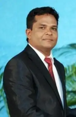 Hussain Sobah receiving an award