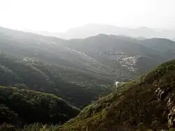 A view looking down onto the gondola that goes up Mount Song