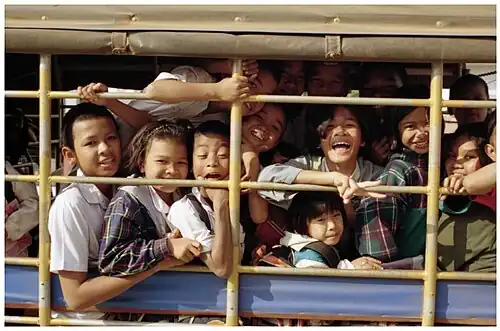 A songthaew loaded with students heading home in Sisaket province