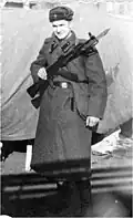 A Soviet infantry soldier with an AKM fitted with a 6KH3 bayonet.