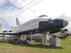Full-scale replica of a Space Shuttle orbiter which once stood adjacent to the United States Astronaut Hall of Fame
