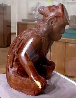 "Resting Warrior", side view, effigy pipe of Missouri flint clay